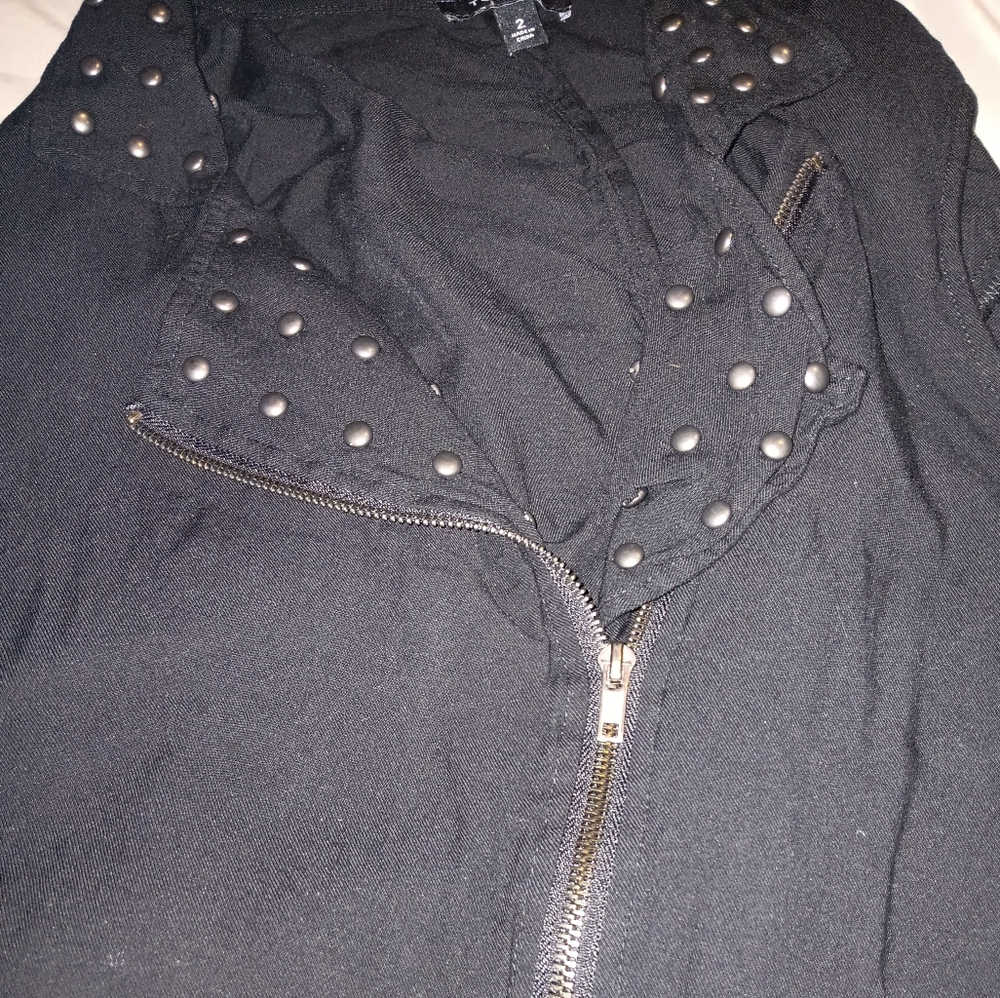 Woman vest size 2 torrid w metal beads